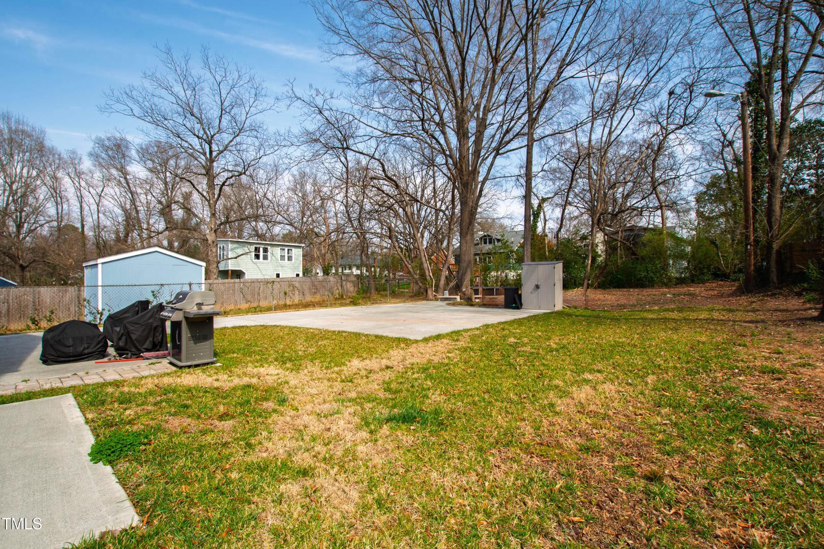 512 Spruce Street, Unit A Durham, NC 27703 - Photo 34 of 36 a view of a swimming pool with an outdoor seating