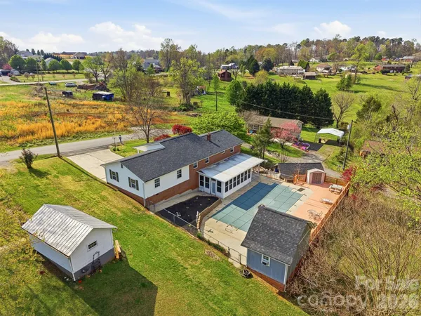 a view of a swimming pool with a patio