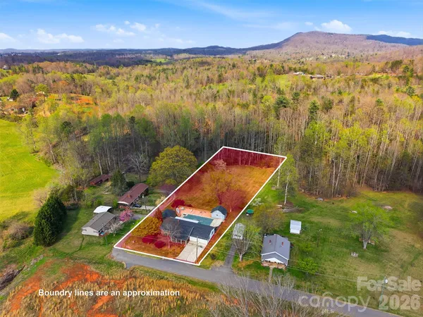 a view of a pool with a yard