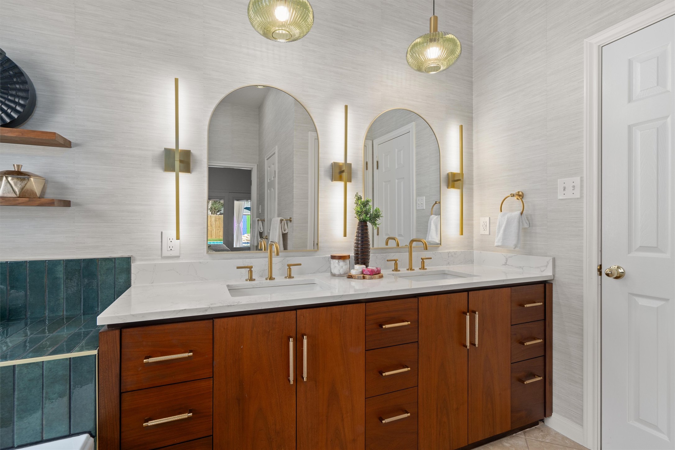 1014 Hackberry Drive Pflugerville, TX 78660 - Photo 18 of 38 The diamond cut pulls and handles are a high end touch to this luxurious bathroom.