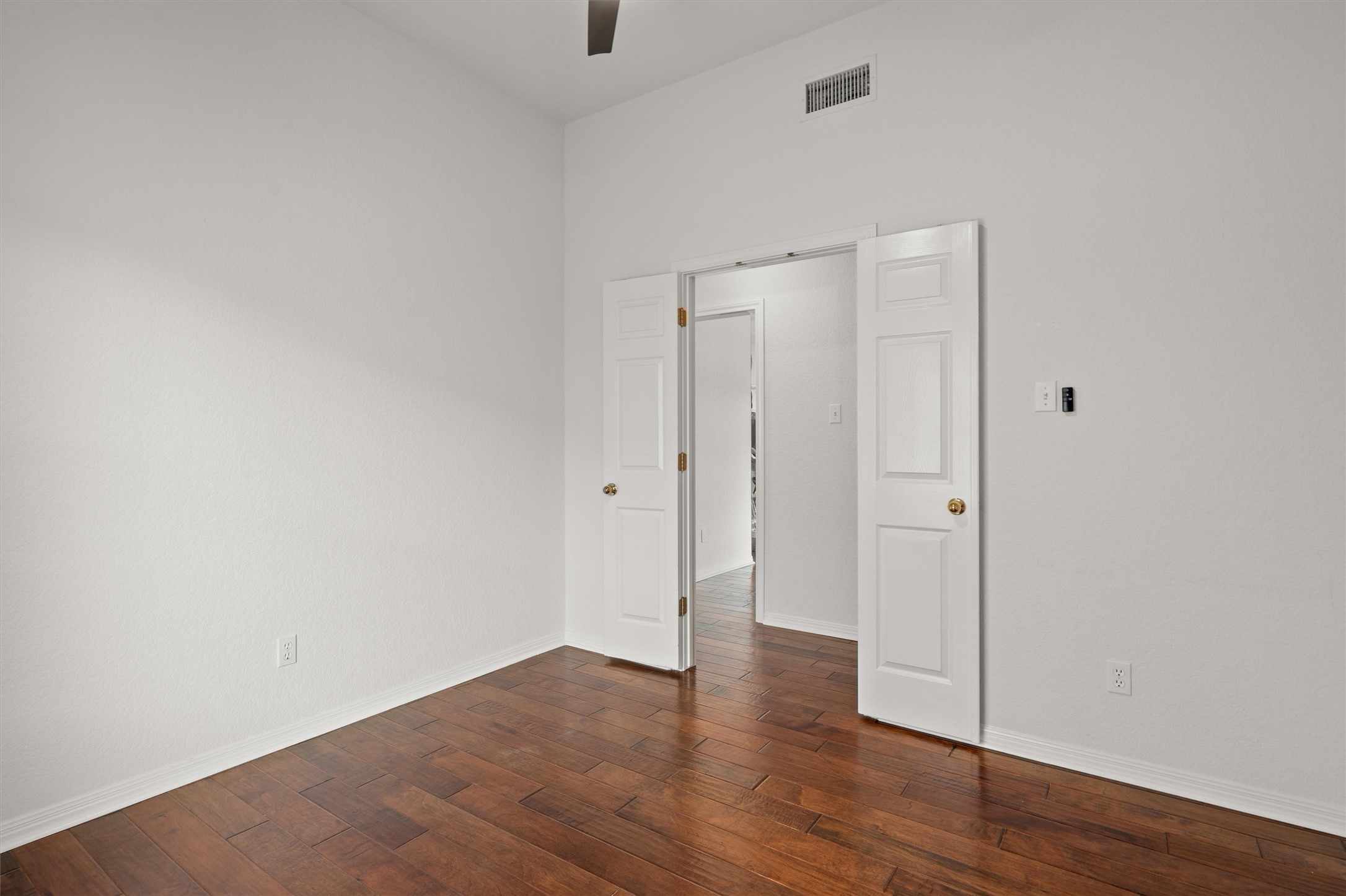 1014 Hackberry Drive Pflugerville, TX 78660 - Photo 26 of 38 The fourth bedroom is on the far side of the home giving guests a private retreat.