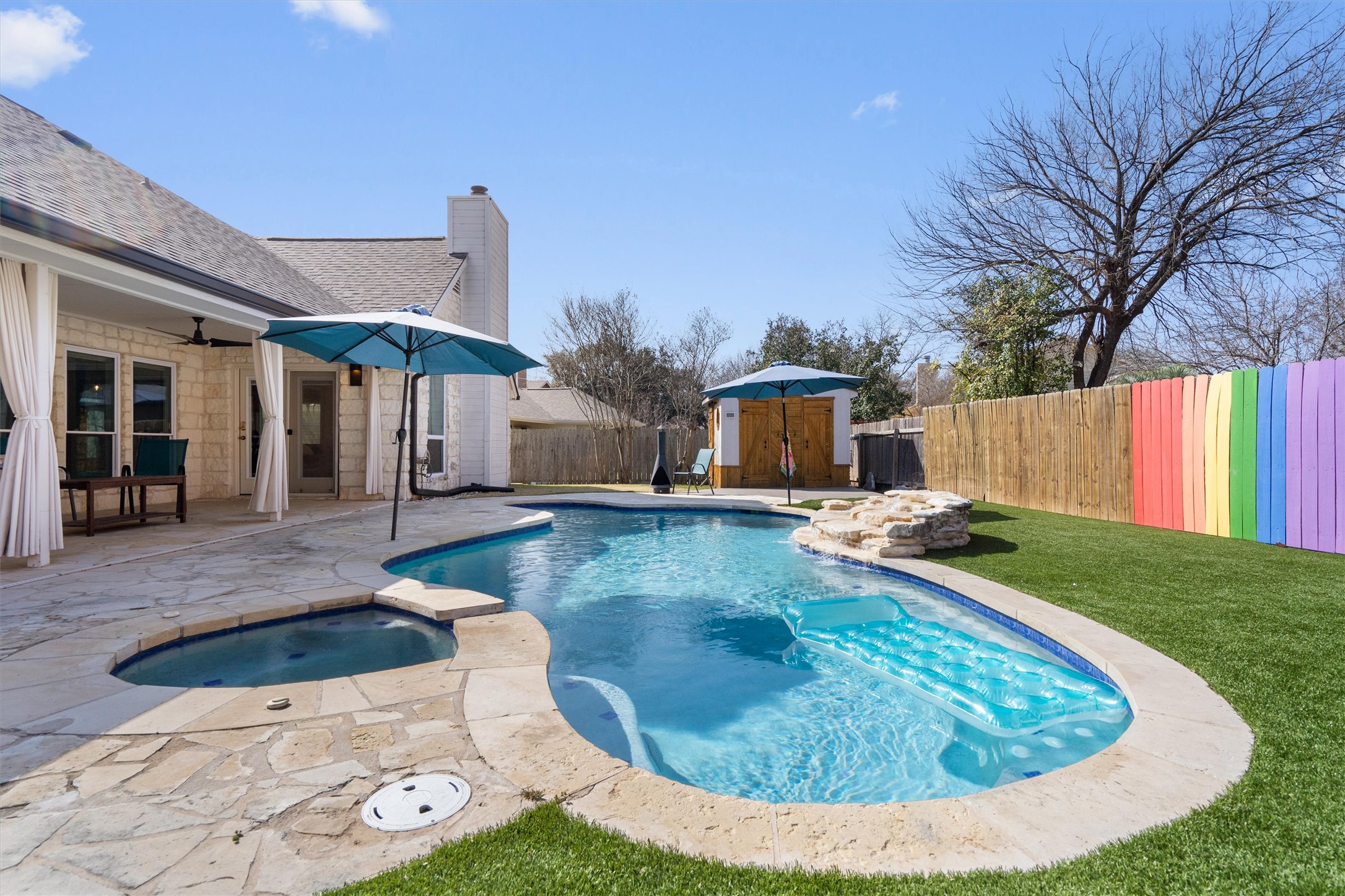 1014 Hackberry Drive Pflugerville, TX 78660 - Photo 28 of 38 The highlight of the home is the low-maintenance backyard.
