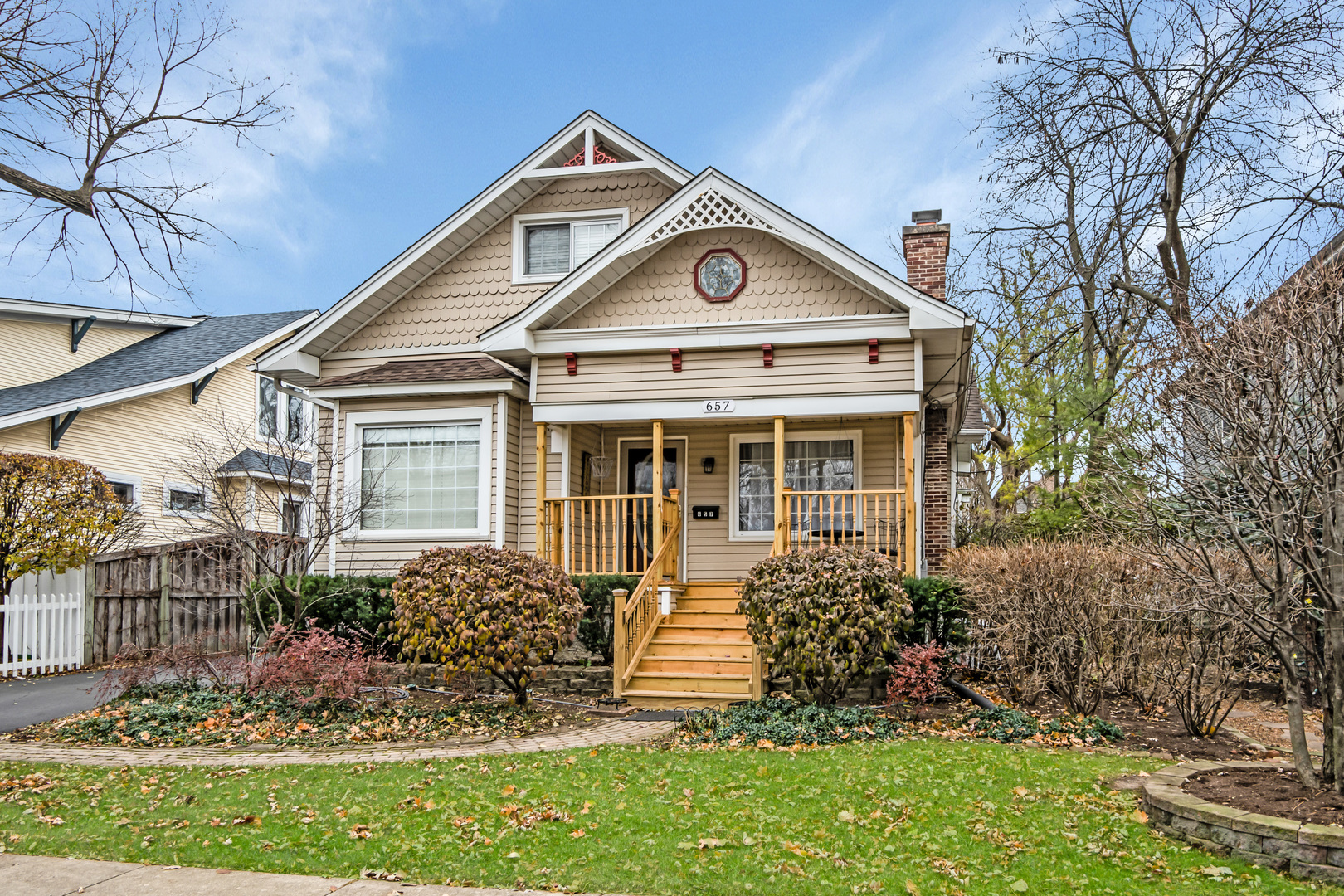 657 Chestnut Street Deerfield, IL 60015 - Photo 1 of 25 a front view of a house with a yard