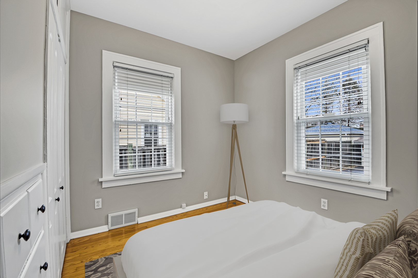 657 Chestnut Street Deerfield, IL 60015 - Photo 13 of 25 a bedroom with a bed and a window
