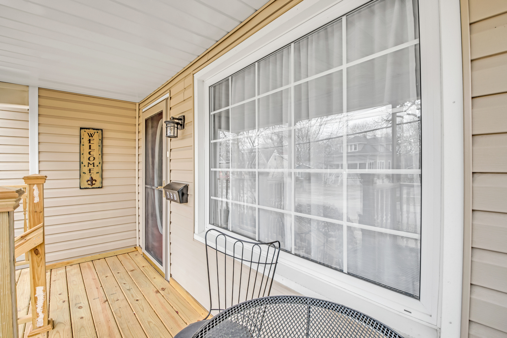 657 Chestnut Street Deerfield, IL 60015 - Photo 2 of 25 a view of a balcony with a window