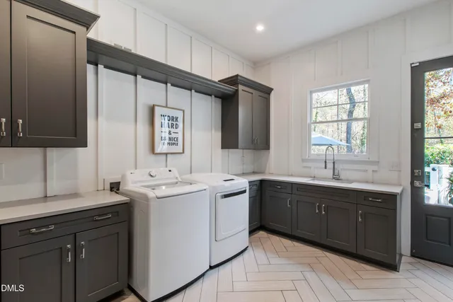 a kitchen with a sink and cabinets