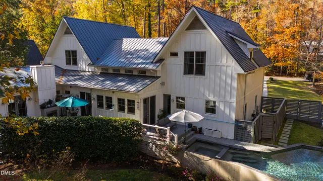 a front view of house with a garden