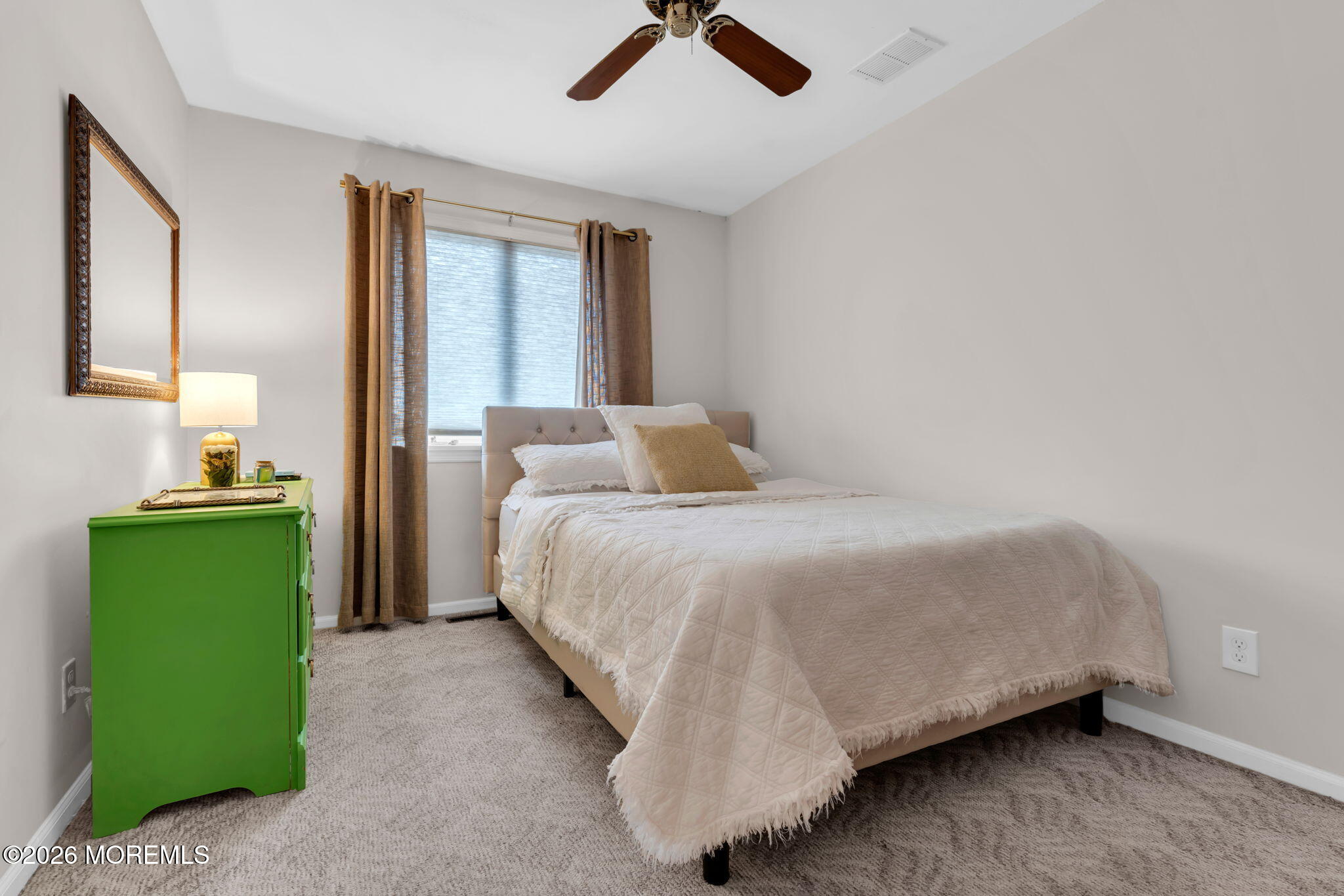 29 Green Island Road Toms River, NJ 08753 - Photo 25 of 63 a bedroom with a bed and a mirror