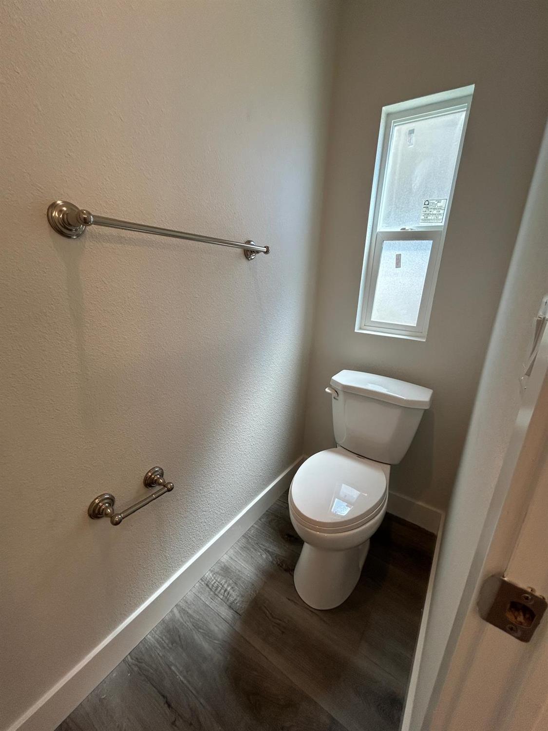 9060 Auburn Folsom Road, Unit 25 Granite Bay, CA 95746 - Photo 27 of 29 a bathroom with a toilet and a shower