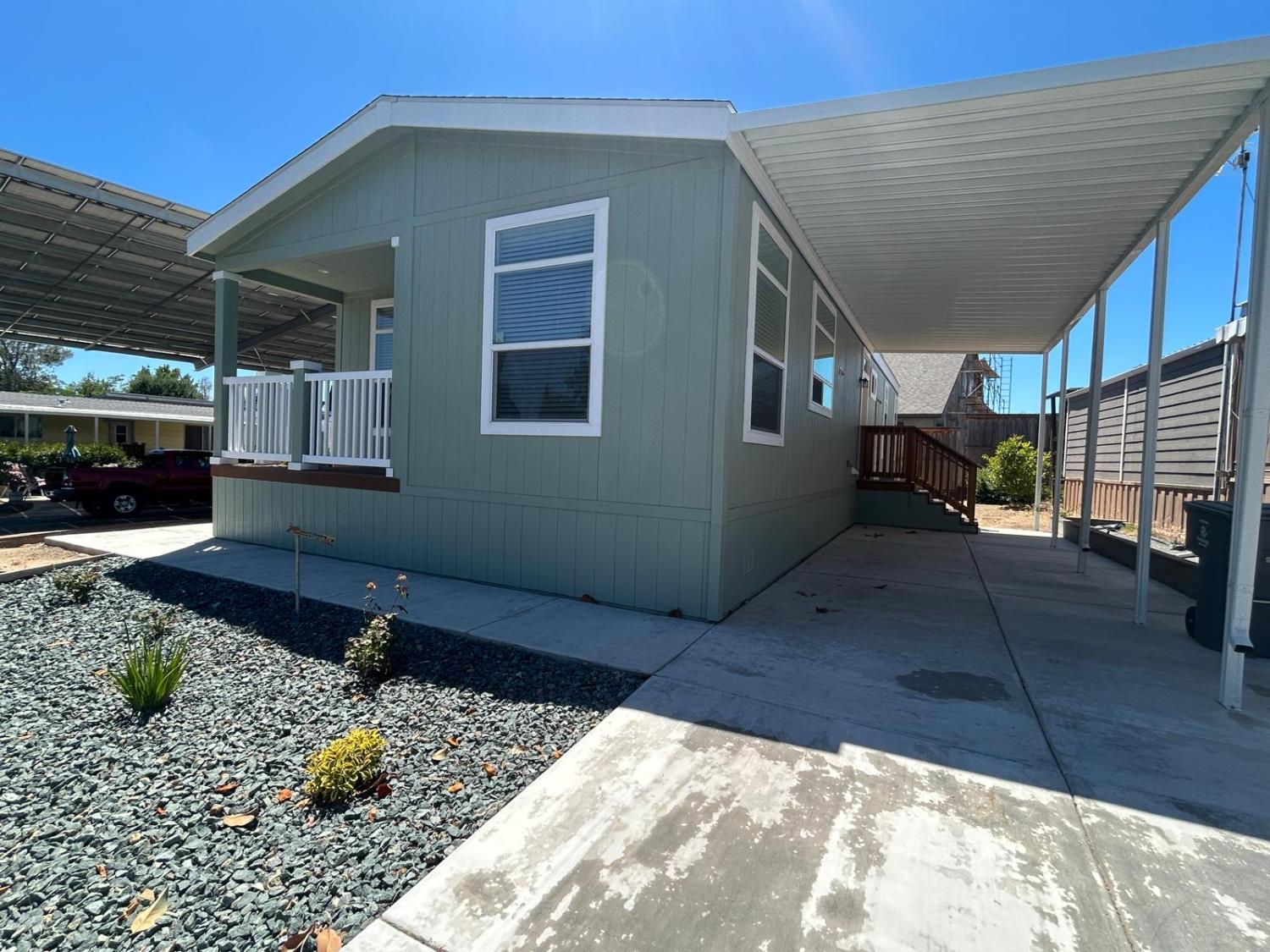 9060 Auburn Folsom Road, Unit 25 Granite Bay, CA 95746 - Photo 3 of 29 a backyard of a house with outdoor seating