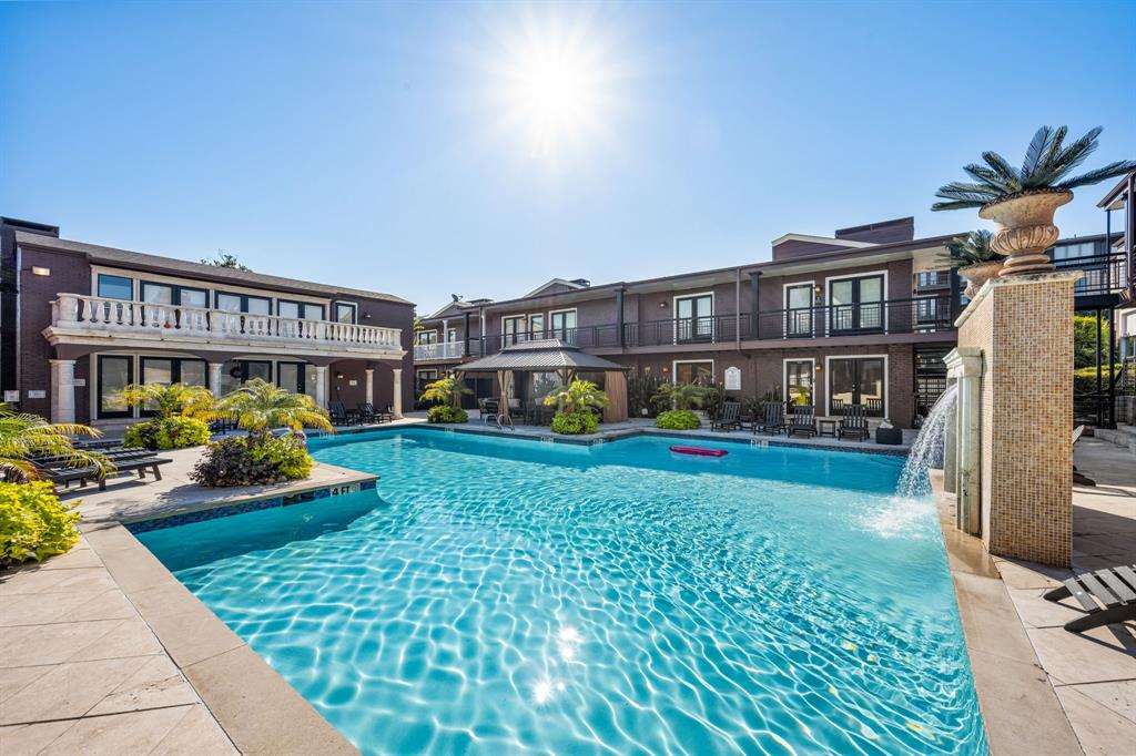 5934 Sandhurst Lane, Unit 109 Dallas, TX 75206 - Photo 9 of 15 a view of an house with backyard and sitting area