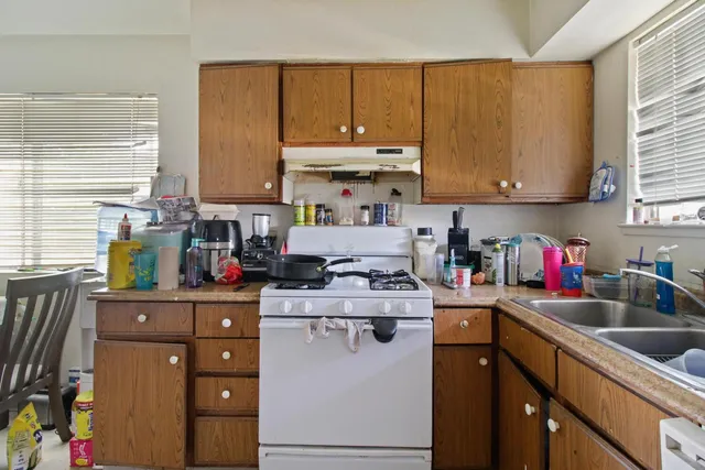 a view of a workspace with furniture