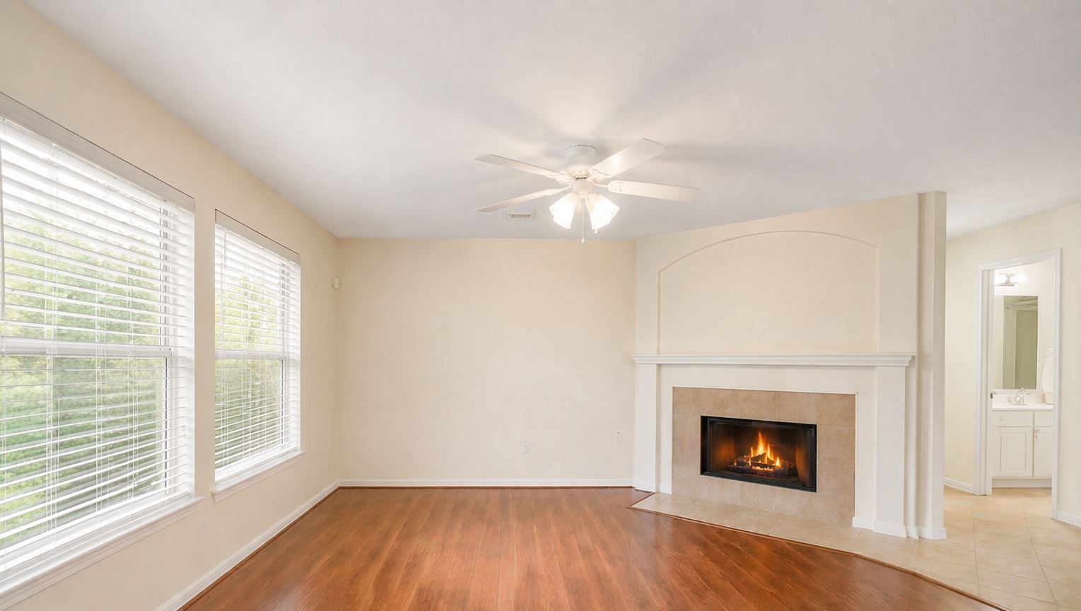 3522 Brackenfern Road Katy, TX 77449 - Photo 6 of 17 a view of a livingroom with a fireplace wooden floor and a window