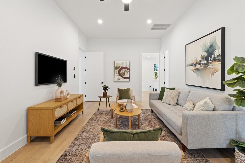 47 War Bonnet Wimberley, TX 78676 - Photo 21 of 40 Living area featuring wood finished floors, ceiling fan, and recessed lighting