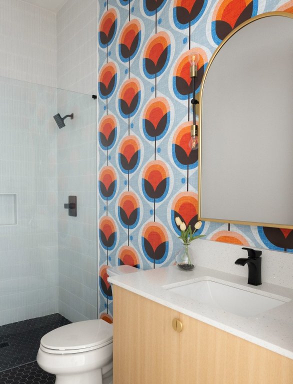 47 War Bonnet Wimberley, TX 78676 - Photo 32 of 40 Bathroom featuring wallpapered walls, vanity, and a tile shower