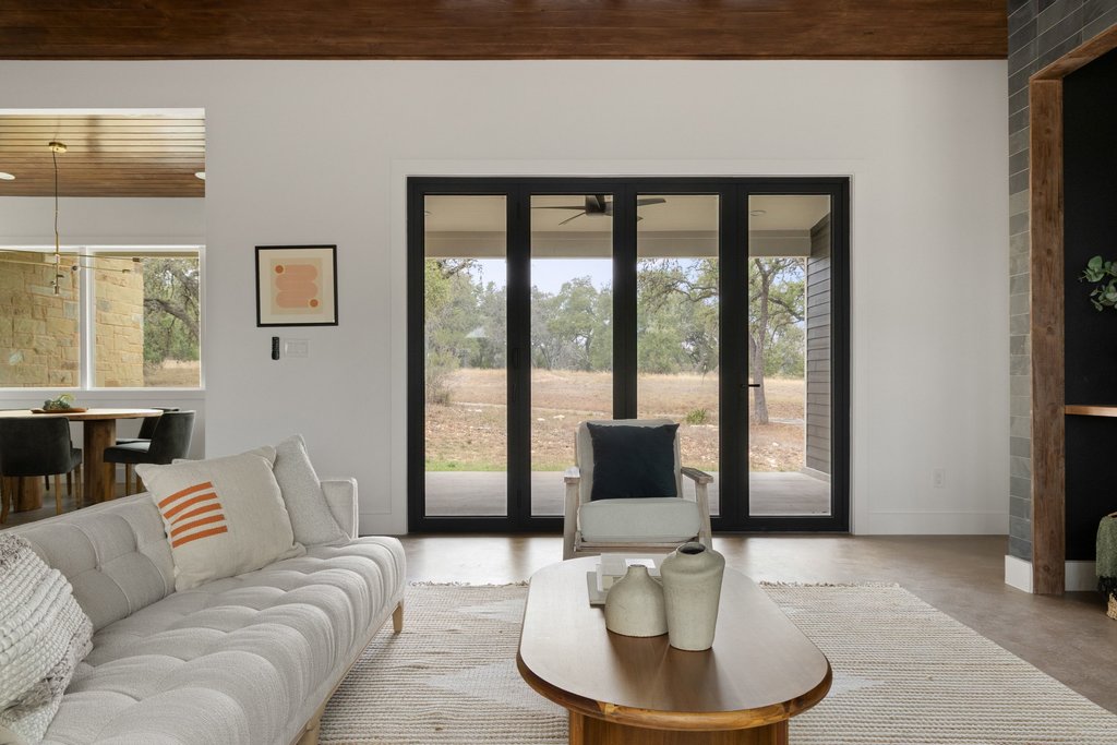 47 War Bonnet Wimberley, TX 78676 - Photo 9 of 40 Living area with wood ceiling and finished concrete floors
