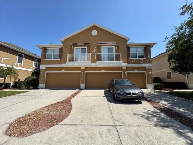 a car parked in front of a house