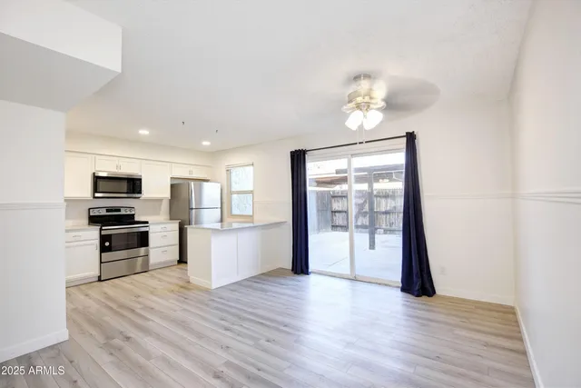 a view of staircase with rug