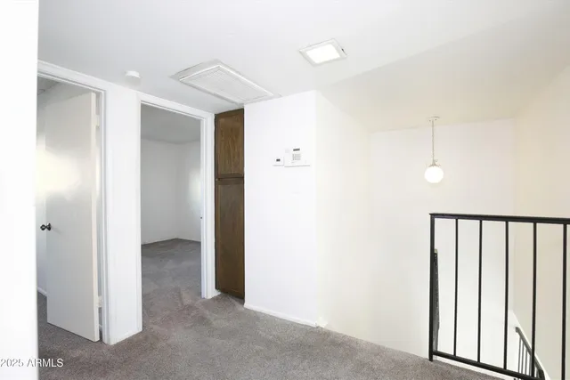 a kitchen with a refrigerator stove and microwave