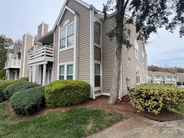 a view of a house with a garden