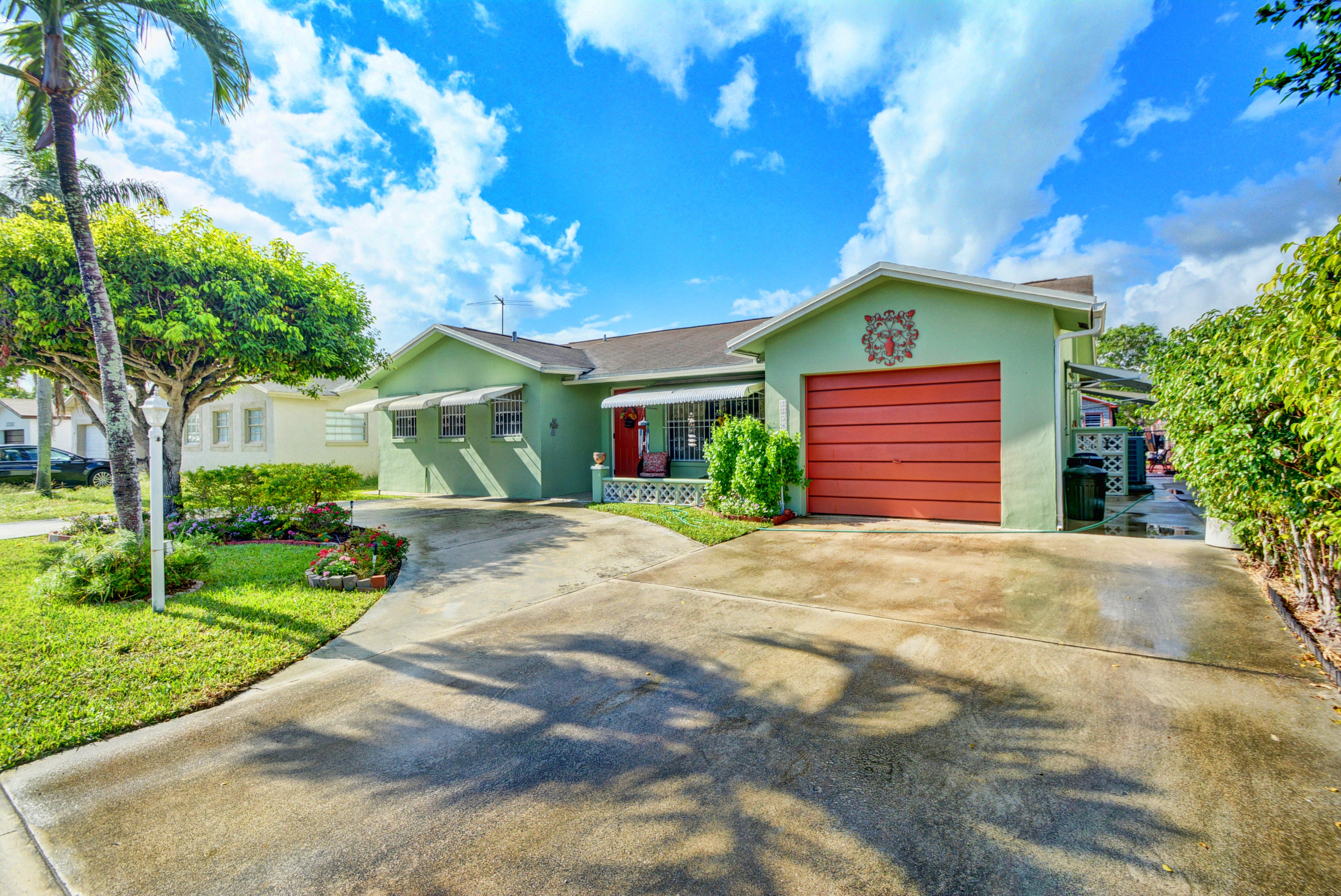 22349 Southwest 65th Avenue Boca Raton, FL 33428 - Photo 1 of 40 Front