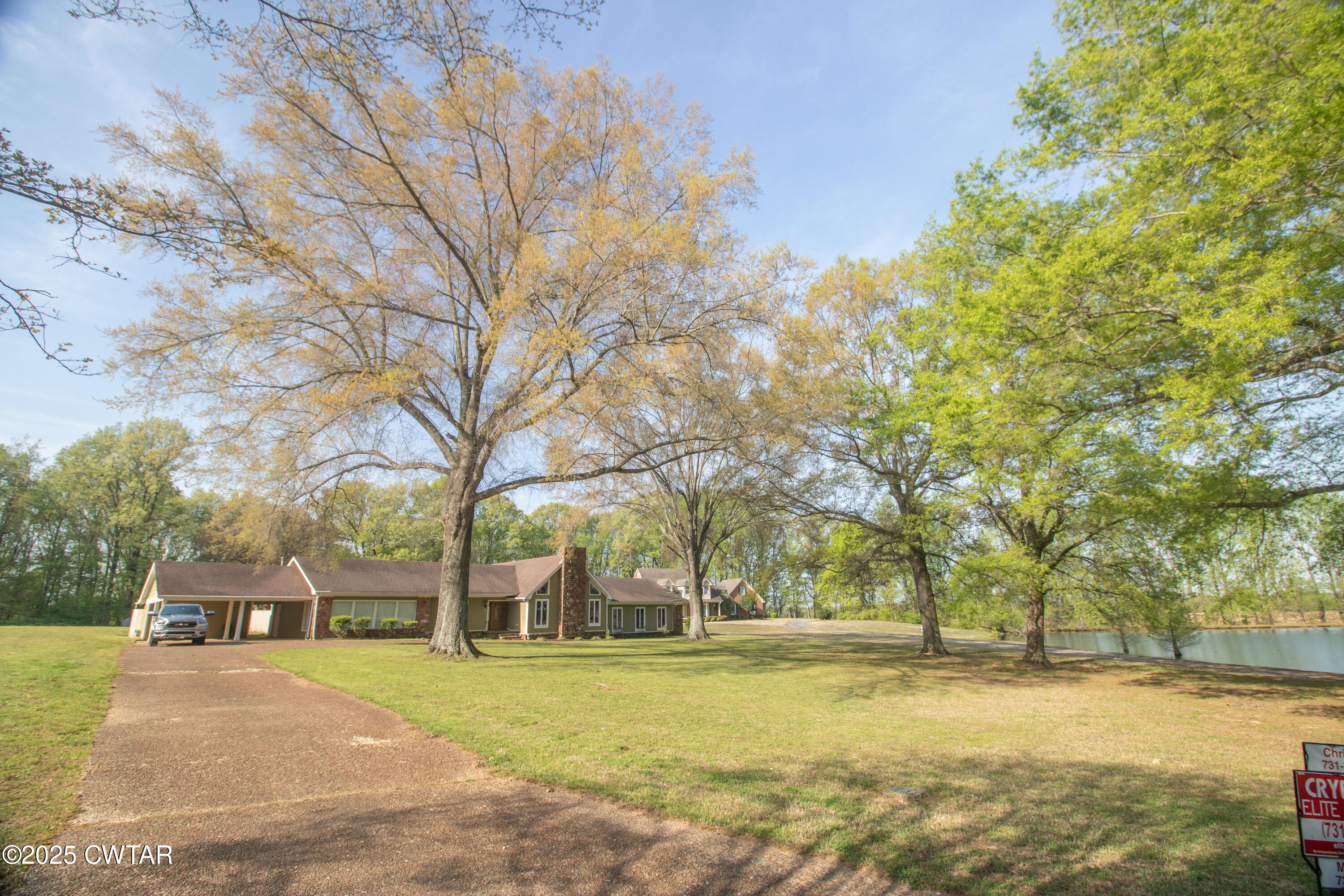 23 Forked Oak Road Humboldt, TN 38343 - Photo 2 of 90 a view of large trees with a big yard
