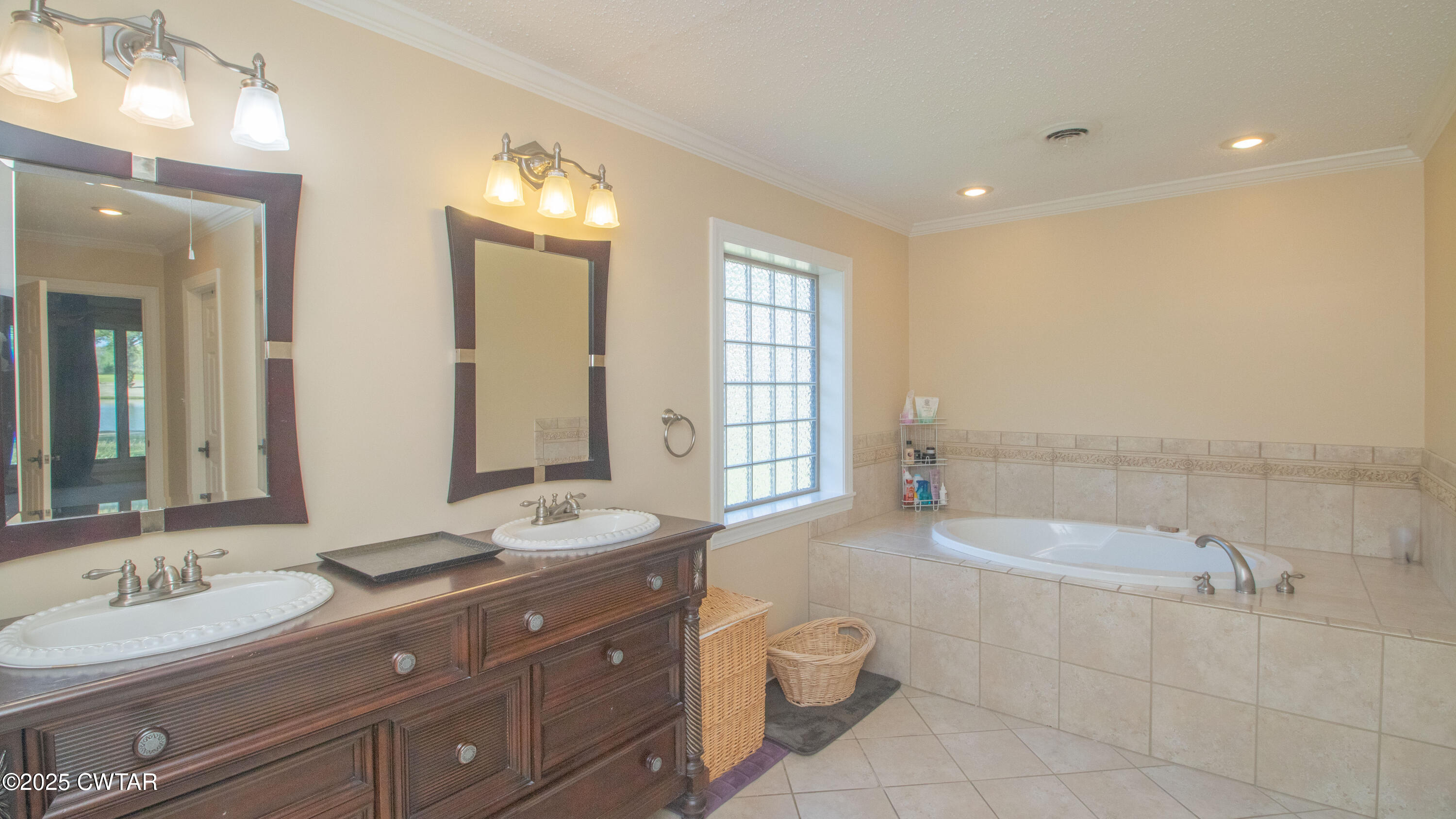 23 Forked Oak Road Humboldt, TN 38343 - Photo 41 of 90 a bathroom with a granite countertop sink toilet and shower
