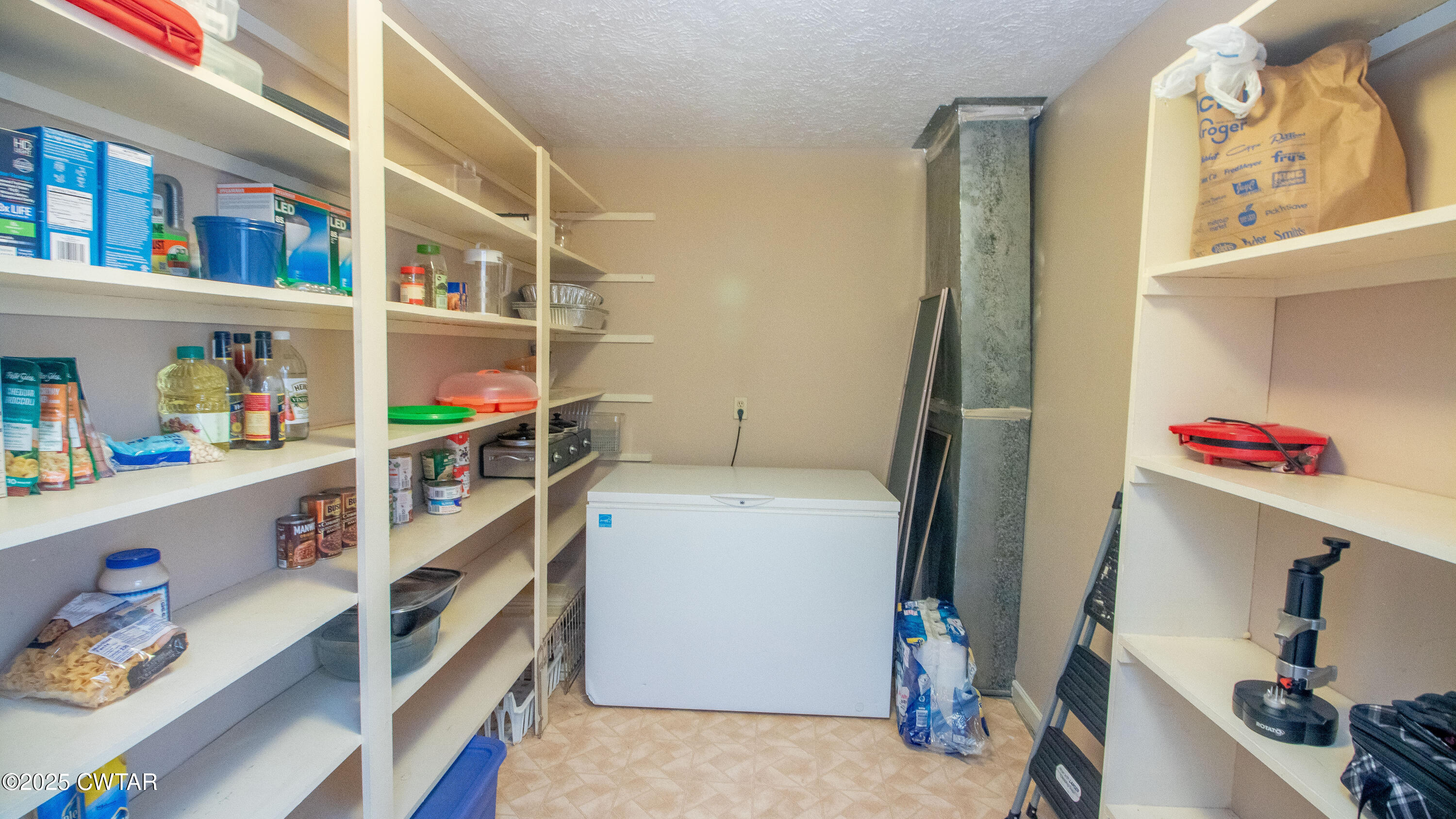 23 Forked Oak Road Humboldt, TN 38343 - Photo 55 of 90 a storage room with washer and dryer