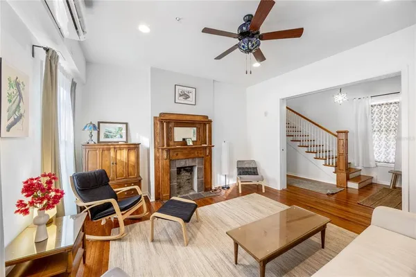 a view of hallway with wooden floor