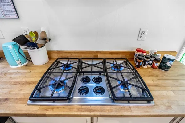 a bedroom with a bed and a fireplace