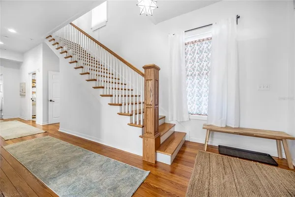 a bathroom with a toilet sink and a window