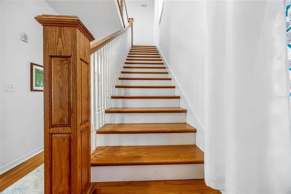 a bathroom with a sink a mirror and a shower