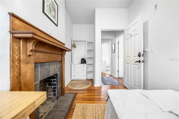a view of a dining room with furniture and a window
