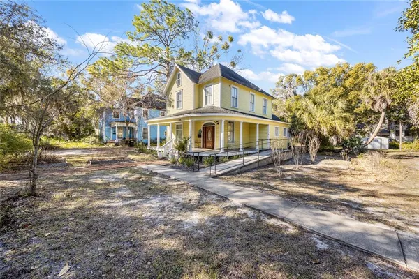 a front view of a house with a porch