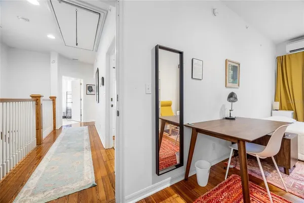 a view of road with large trees