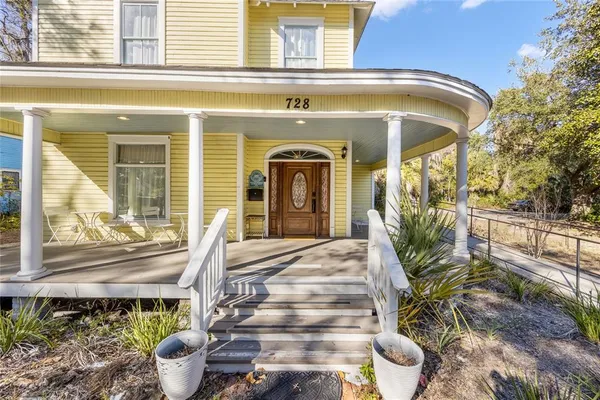 a view of a door with a sign on the wall