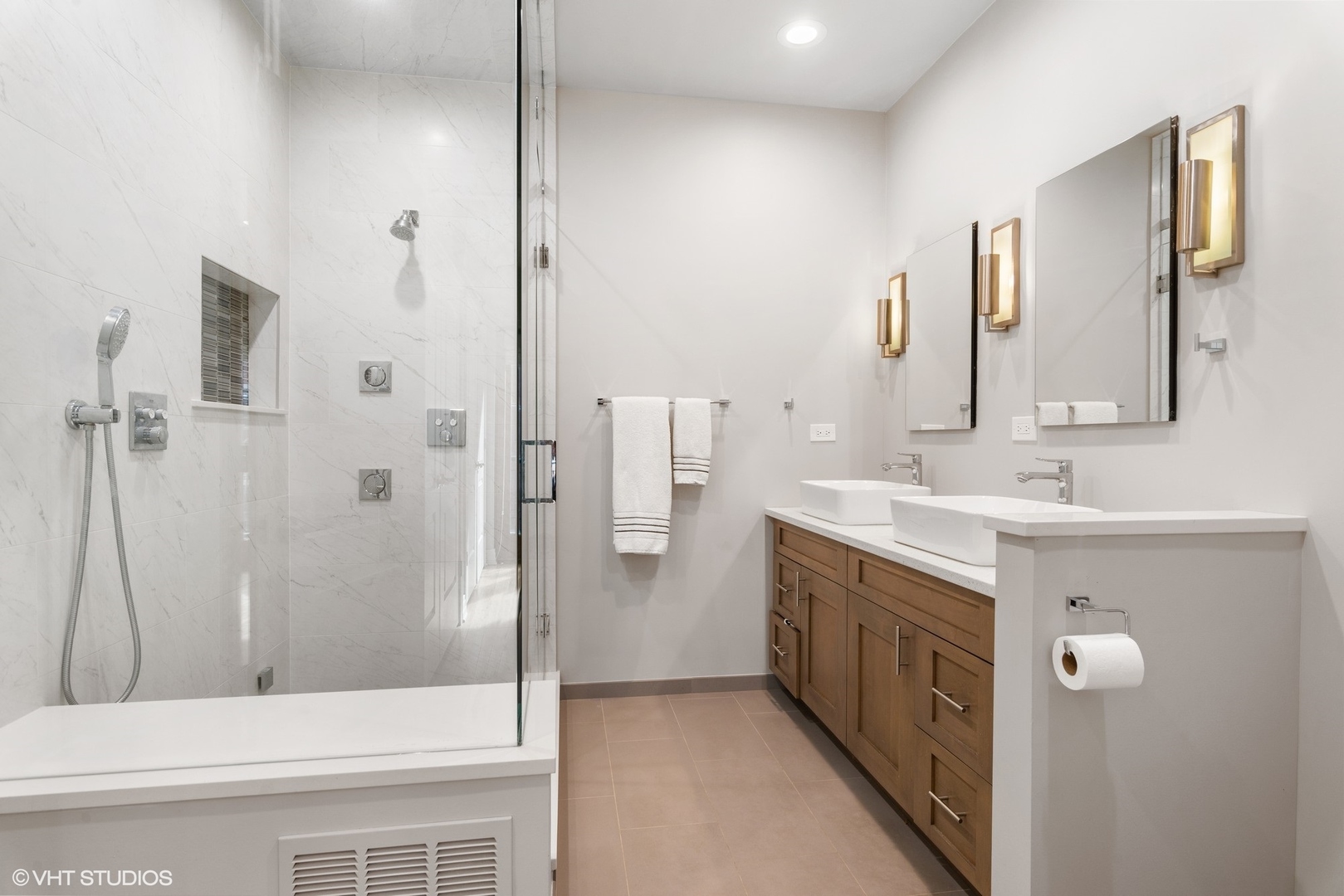 916 West Van Buren Street Chicago, IL 60607 - Photo 17 of 27 a bathroom with a double vanity sink mirror and shower