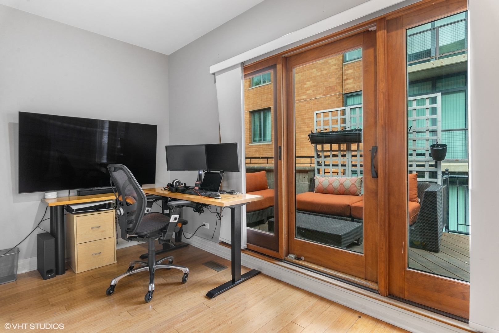 916 West Van Buren Street Chicago, IL 60607 - Photo 19 of 27 a view of a workspace with furniture and a window