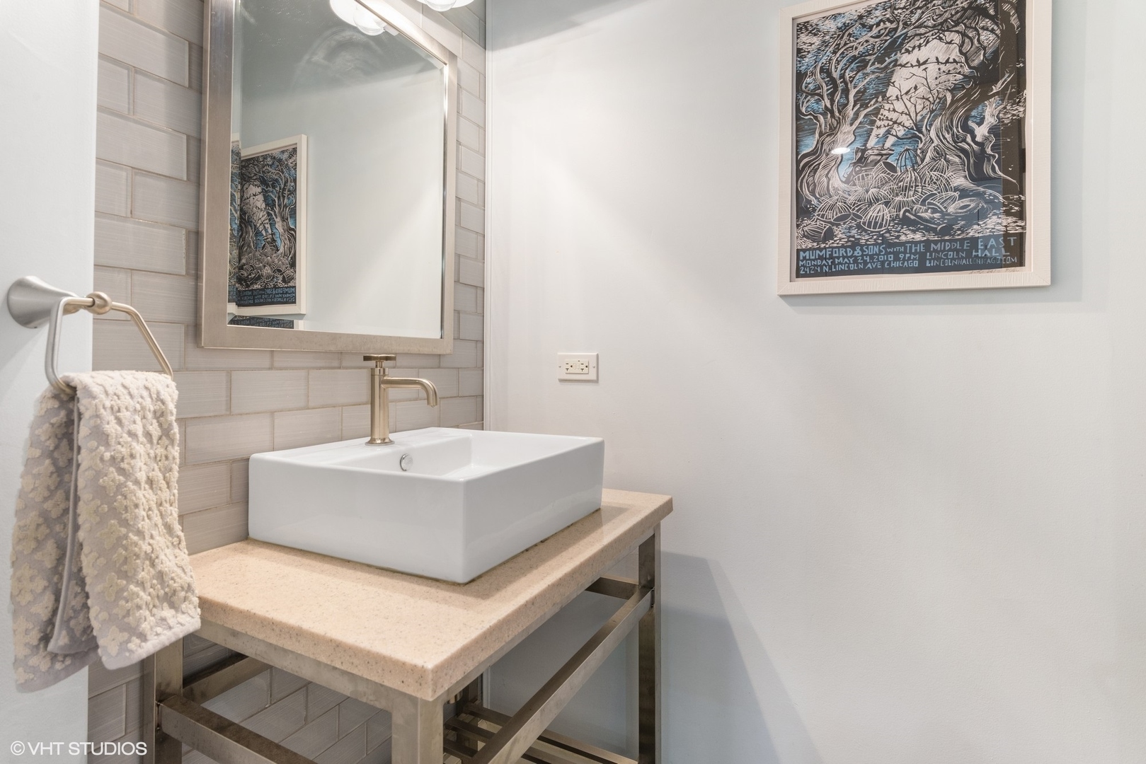 916 West Van Buren Street Chicago, IL 60607 - Photo 10 of 27 a bathroom with a sink and a mirror