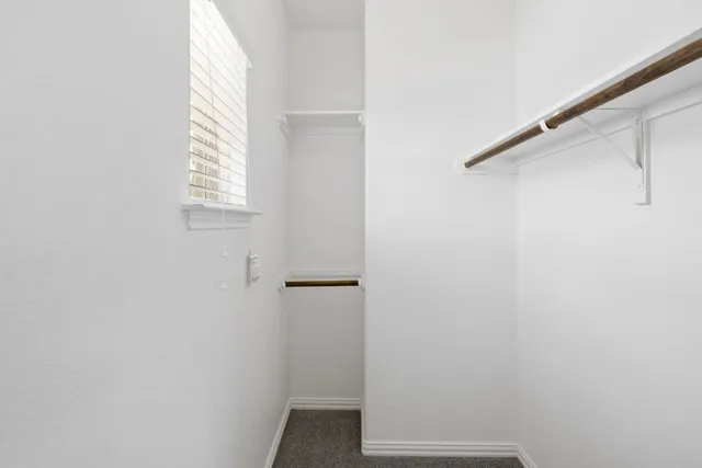 a view of a room with windows