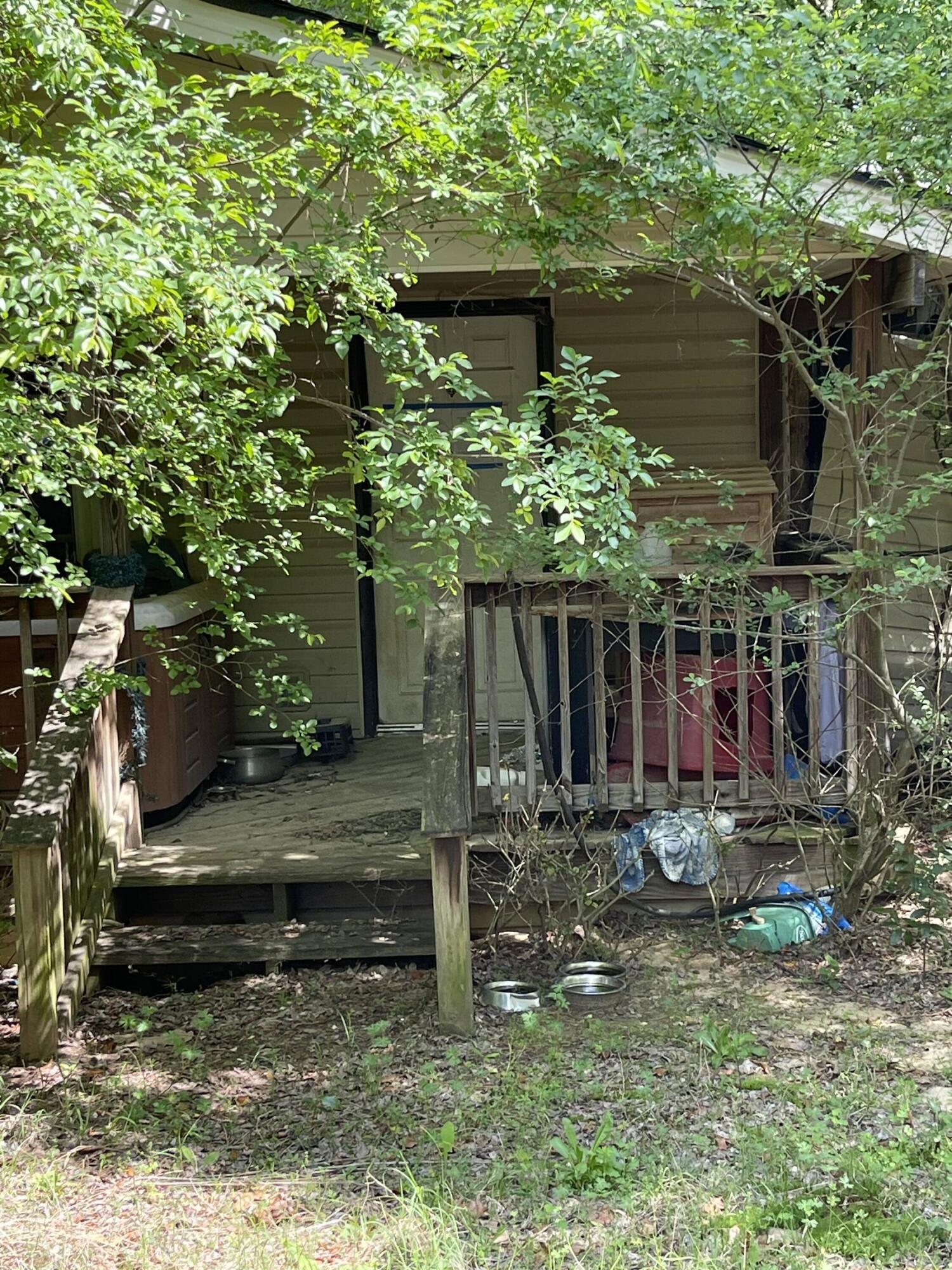 631 Redds Branch Road Aiken, SC 29801 - Photo 2 of 6 a backyard of a house with lots of green space