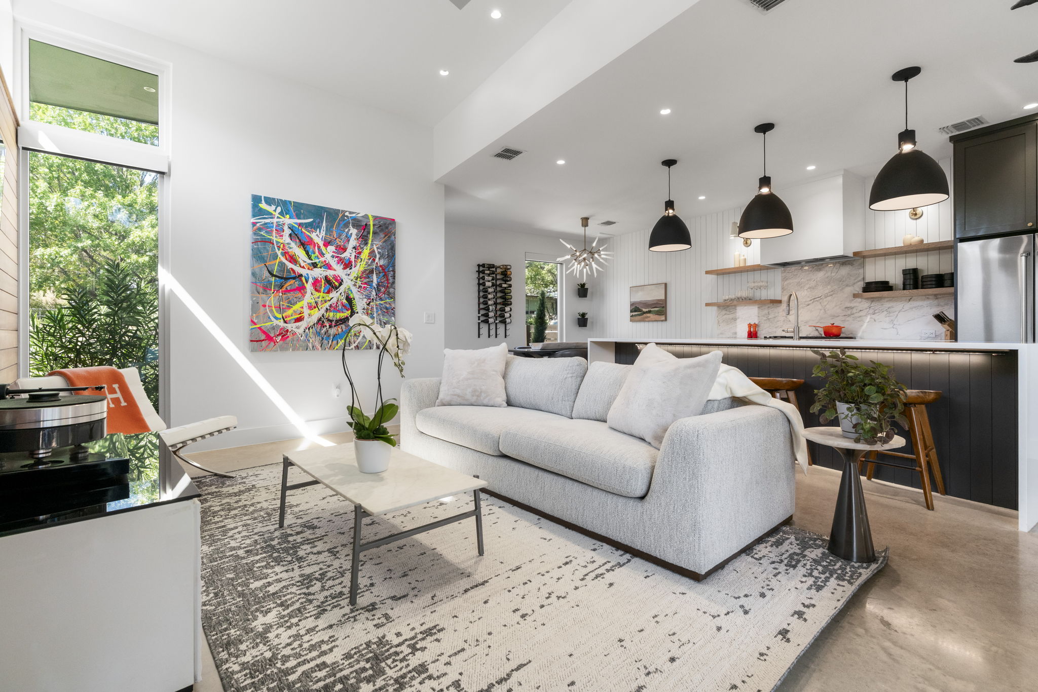 604 Cumberland Road Austin, TX 78704 - Photo 11 of 40 a living room with furniture and a flat screen tv