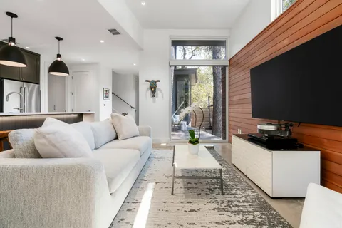 a bedroom with a bed and a lamp