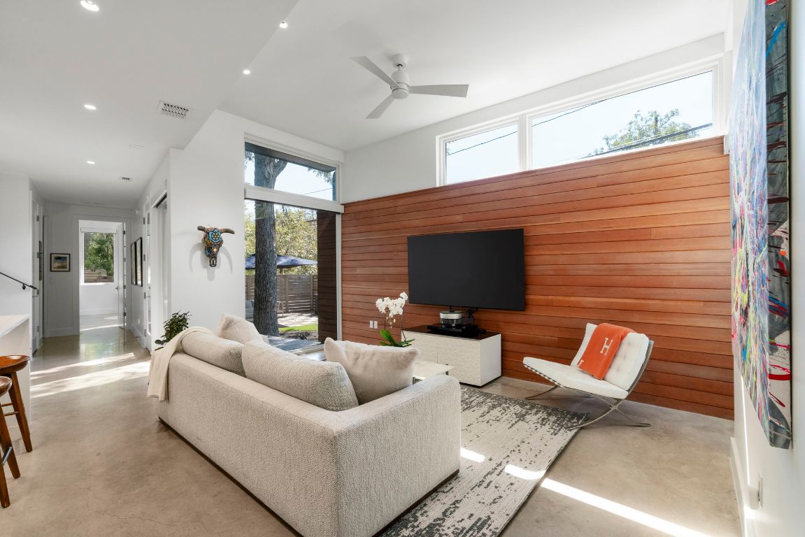 604 Cumberland Road Austin, TX 78704 - Photo 14 of 40 a living room with furniture and a flat screen tv