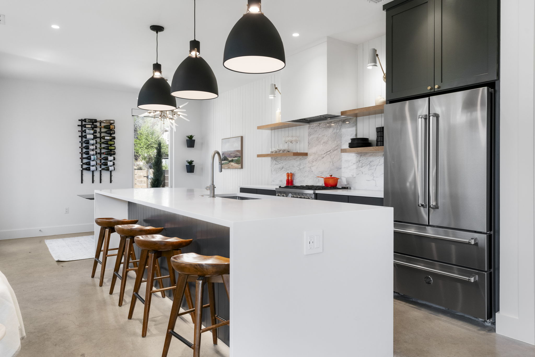 604 Cumberland Road Austin, TX 78704 - Photo 19 of 40 a kitchen with stainless steel appliances granite countertop a refrigerator and a stove top oven
