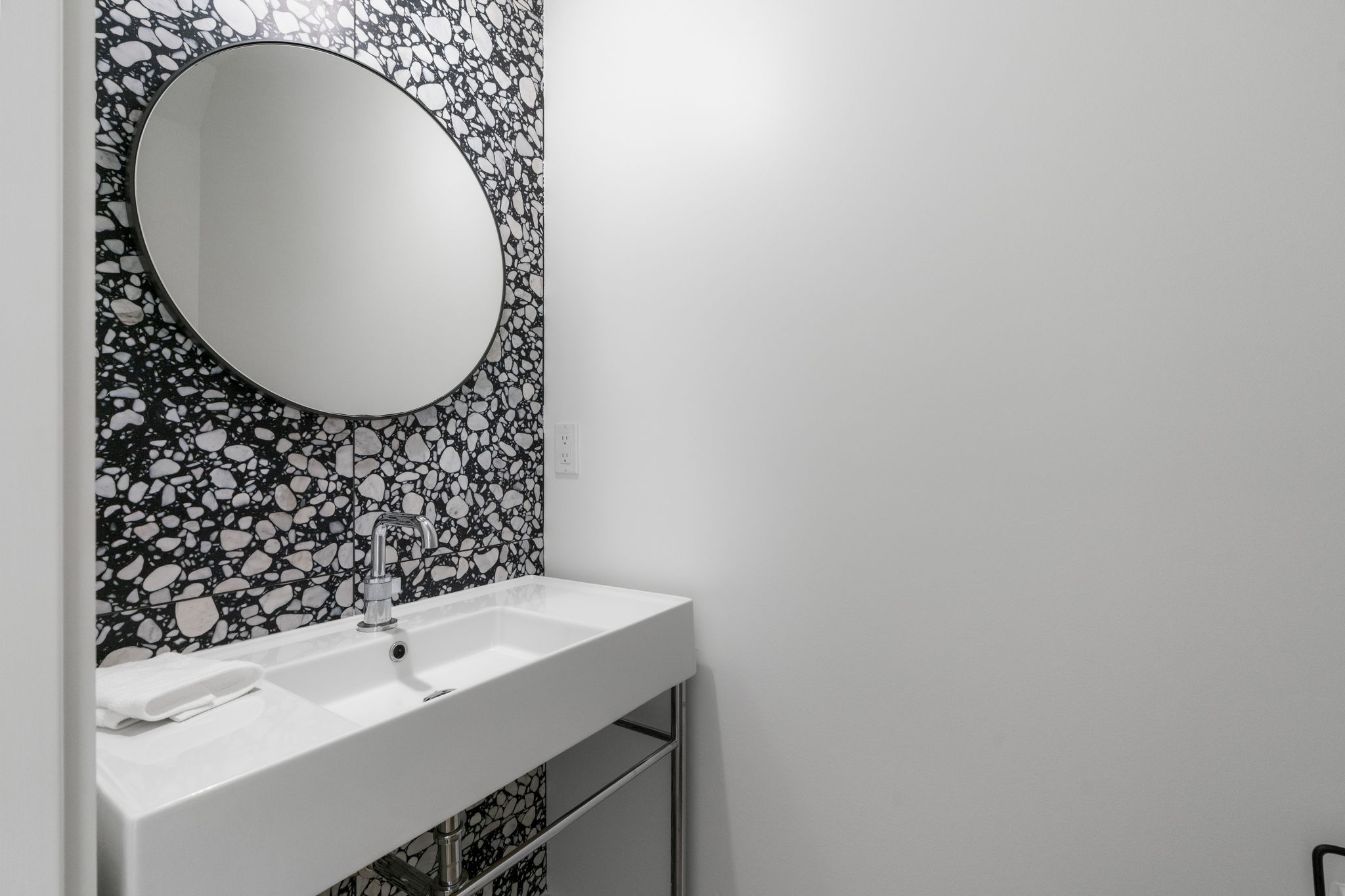 604 Cumberland Road Austin, TX 78704 - Photo 20 of 40 a bathroom with a sink and a mirror