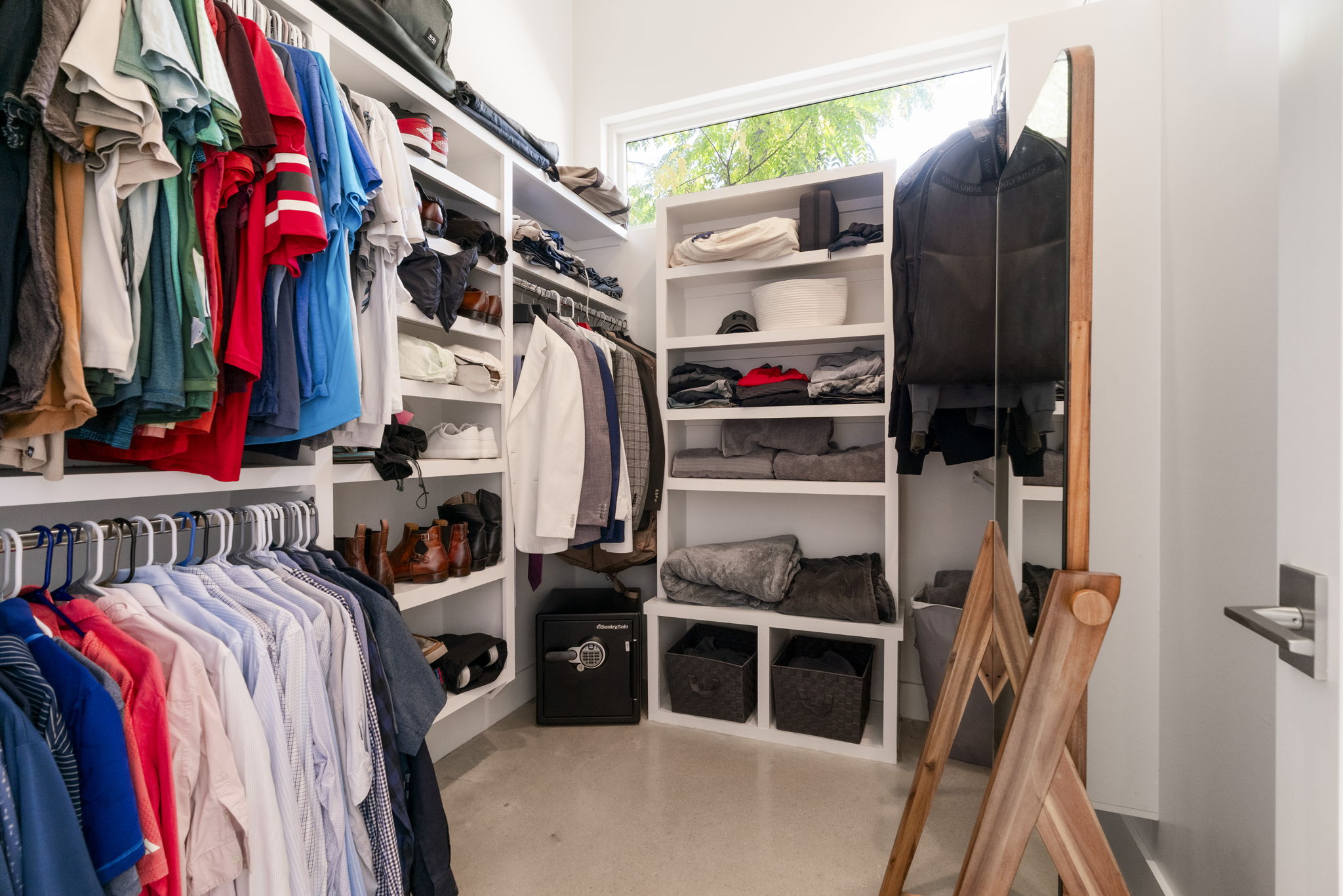 604 Cumberland Road Austin, TX 78704 - Photo 25 of 40 a view of walk in closet with clothes and shoes