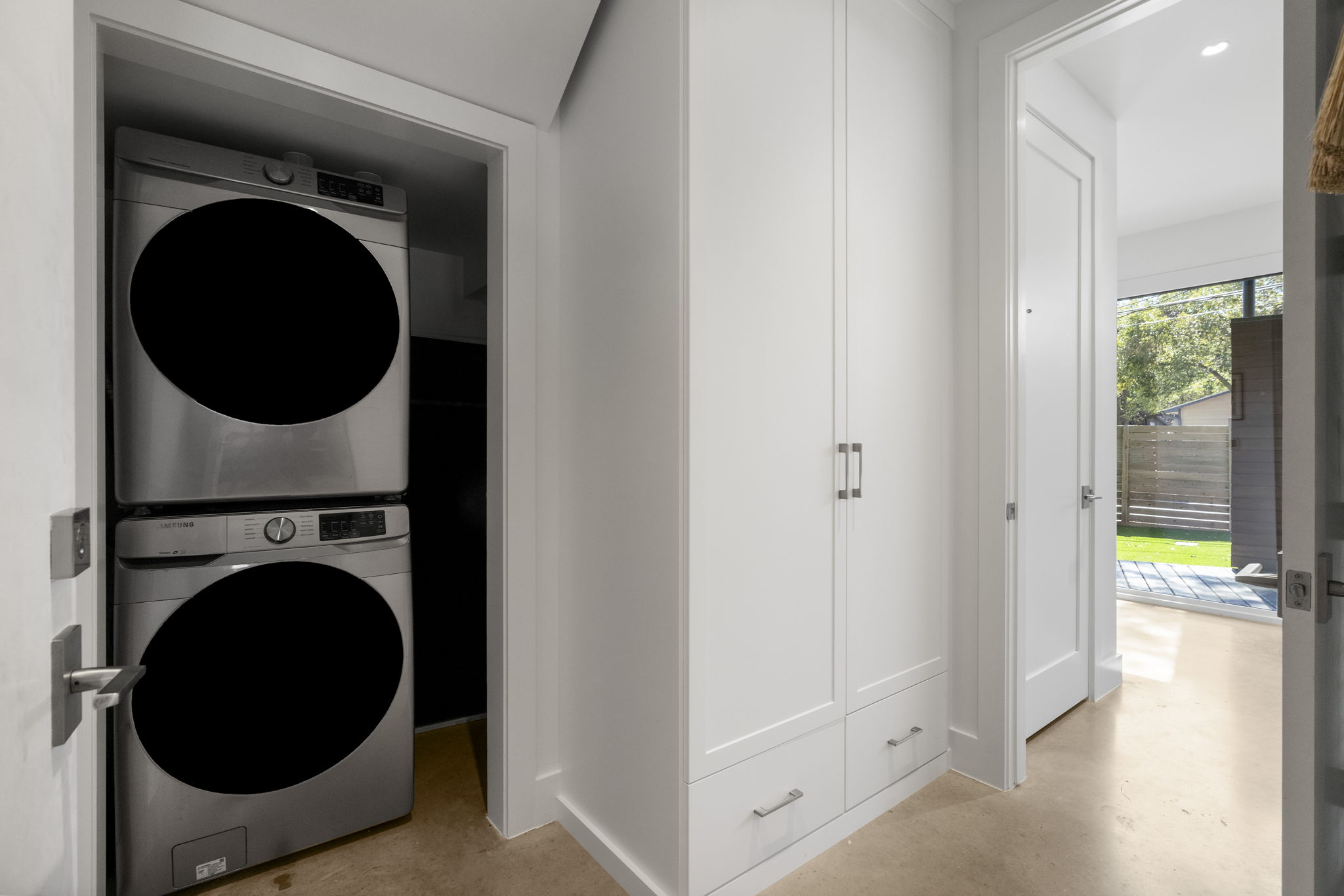 604 Cumberland Road Austin, TX 78704 - Photo 32 of 40 a view of a hallway with washer and dryer
