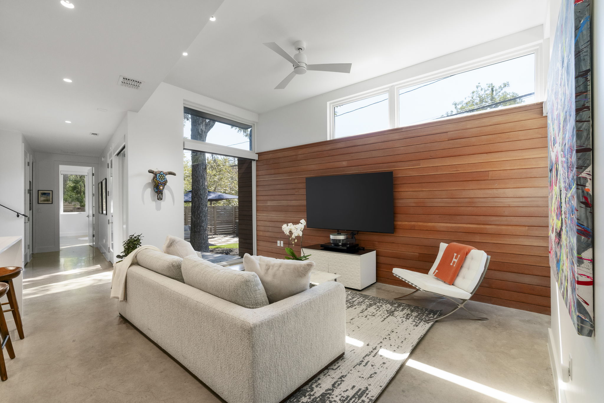 604 Cumberland Road Austin, TX 78704 - Photo 4 of 40 a living room with furniture and a flat screen tv