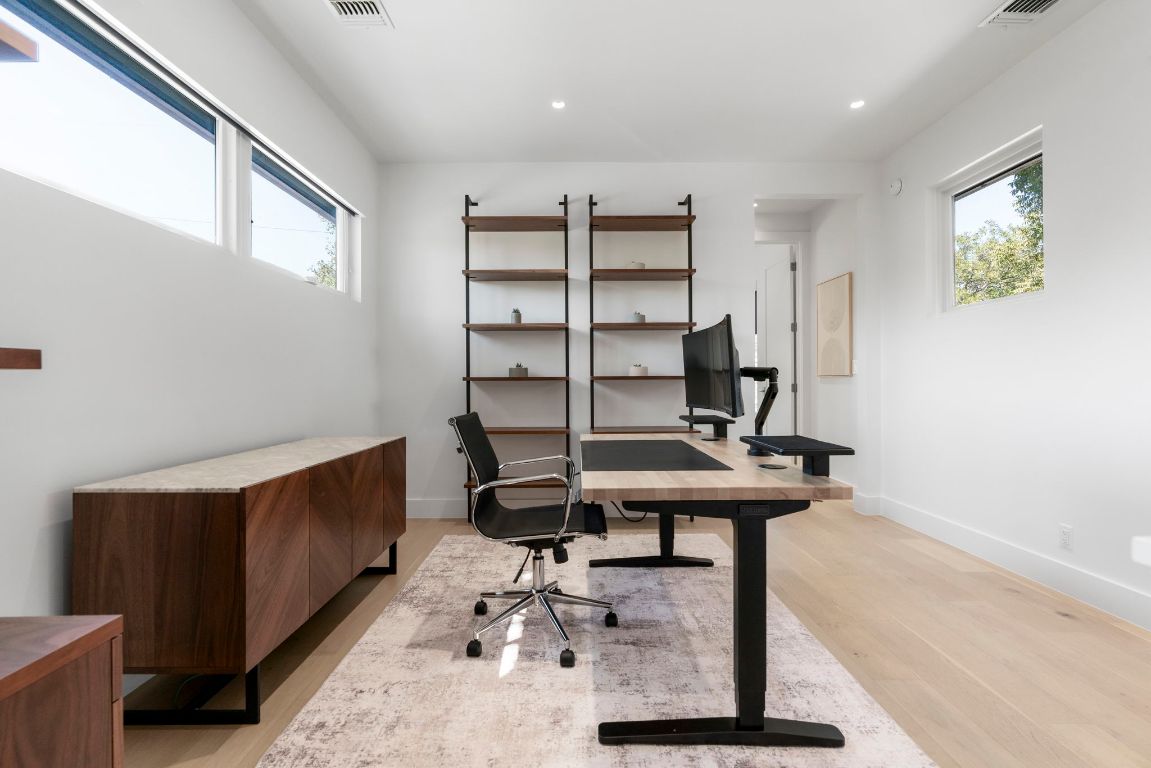 604 Cumberland Road Austin, TX 78704 - Photo 7 of 40 a view of a workspace with furniture